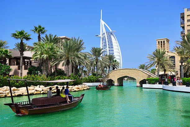 madinat jumeirah and the burj al arab hotel in dubai - uae destinations near dubai for spring travelers stock pictures, royalty-free photos & images
