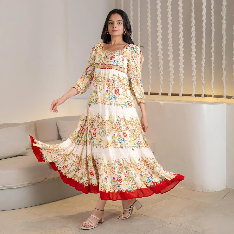 Woman twirling in Royal Bloom One Piece Floral Maxi Dress Ã¢â‚¬â€œ flowy festive outfit for women by Anrobee