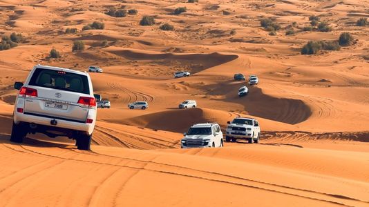 Desert Safari Dubai with 4x4 Dune Bashing, Camel Ride & BBQ Dinner Under The Stars