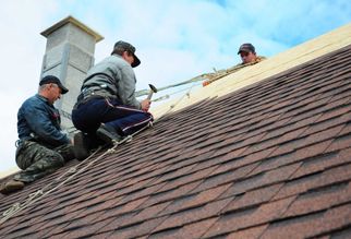 Can Amish Roofing Contractors Install Seamless Gutters and Siding?